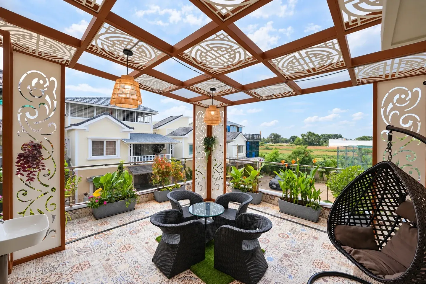 View from the terrace seating area towards neighbouring homes through the pergola frame