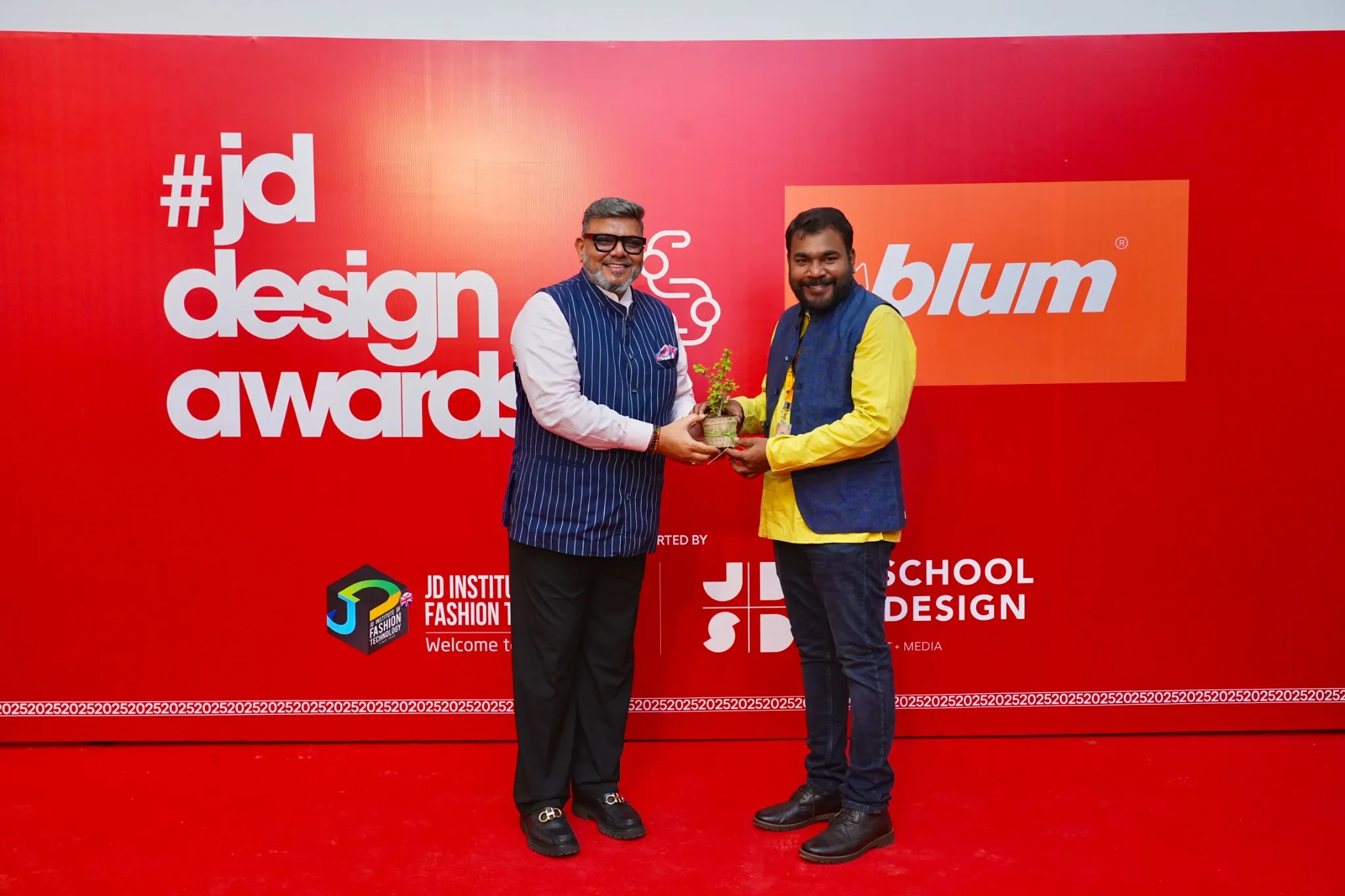 Award presentation at a JD Design Awards event