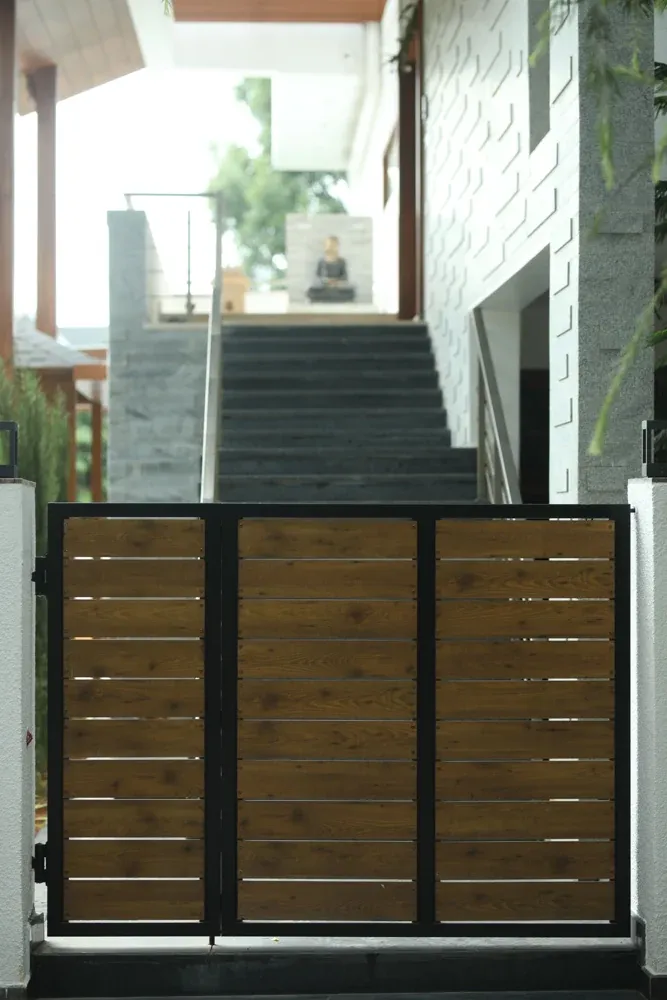 A matching pedestrian gate completes the entrance to the steps.
