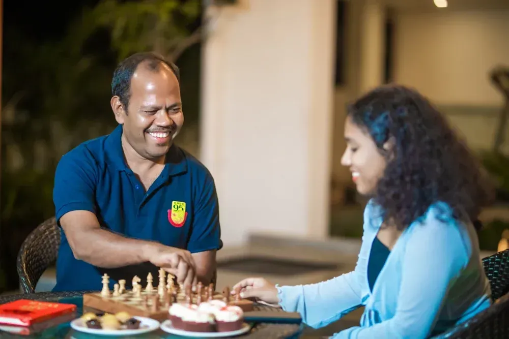 A game of chess brings the finished outdoor space to life.
