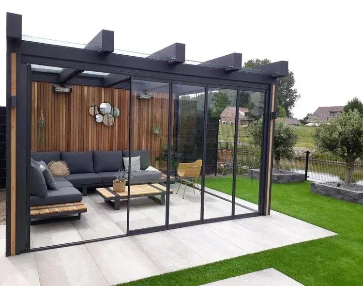 Glass doors and windows connecting indoor and outdoor spaces