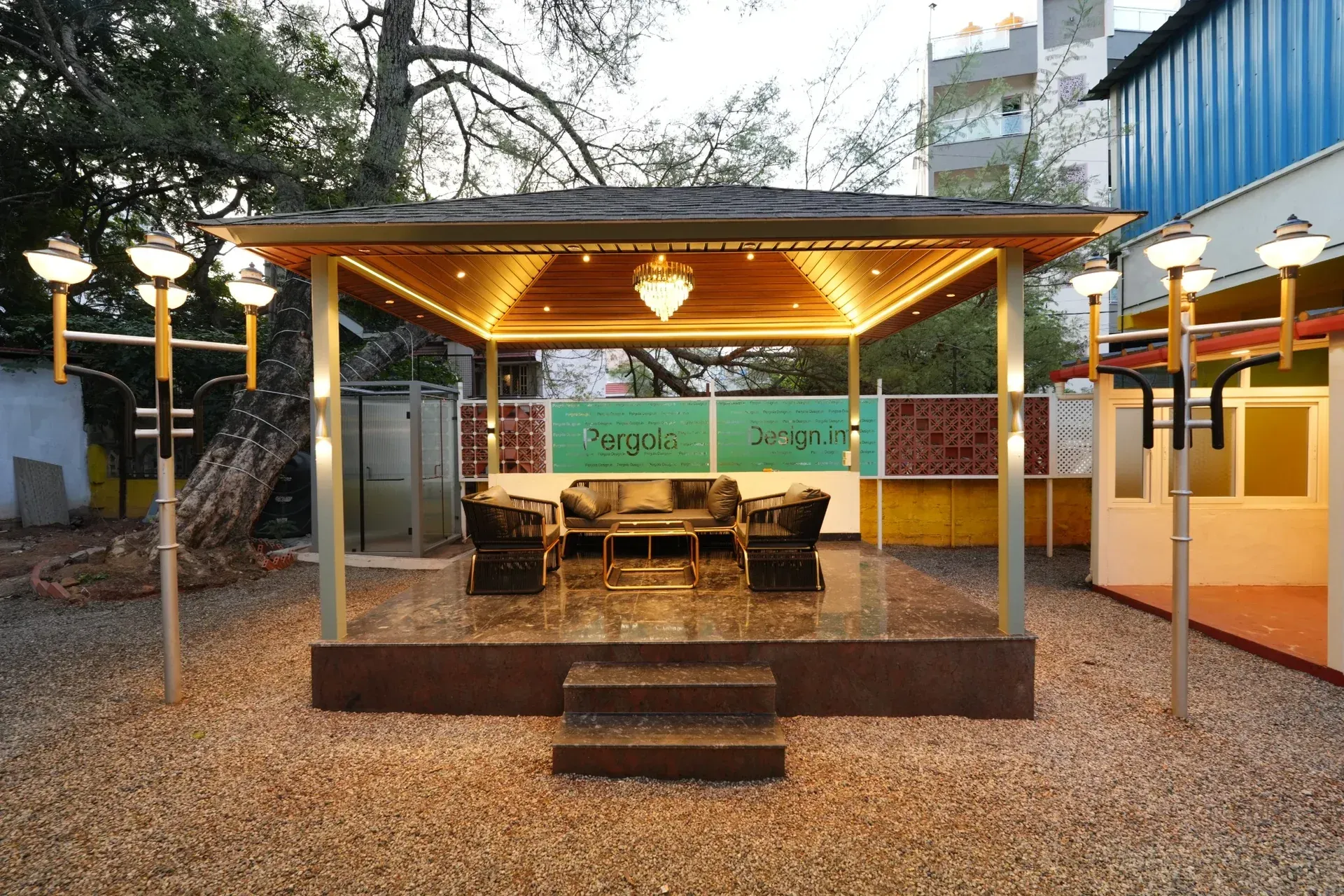 Open premium pergola with an illuminated ceiling and outdoor seating
