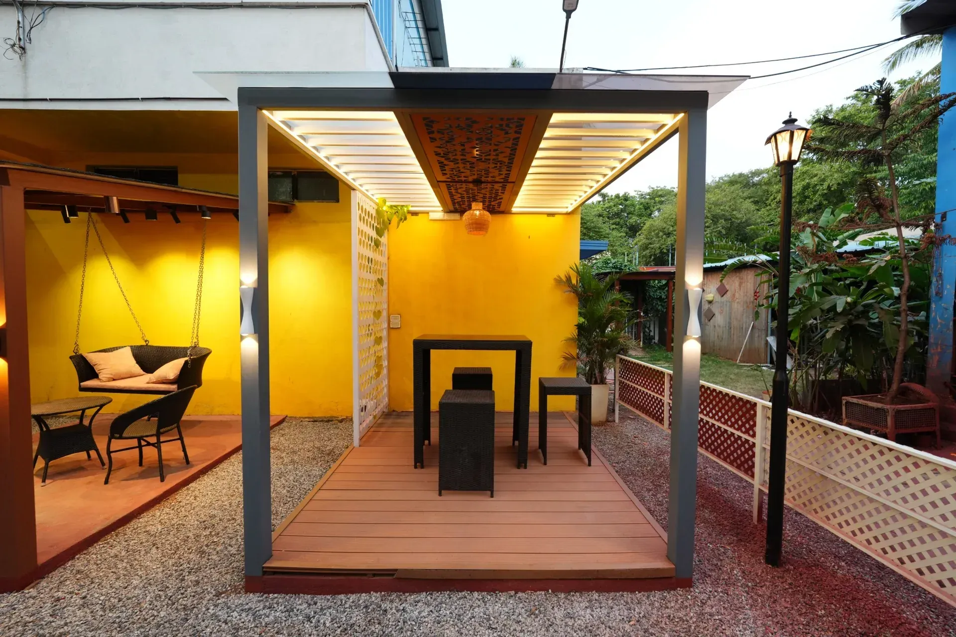 Front view of a premium pergola display with decorative ceiling panels