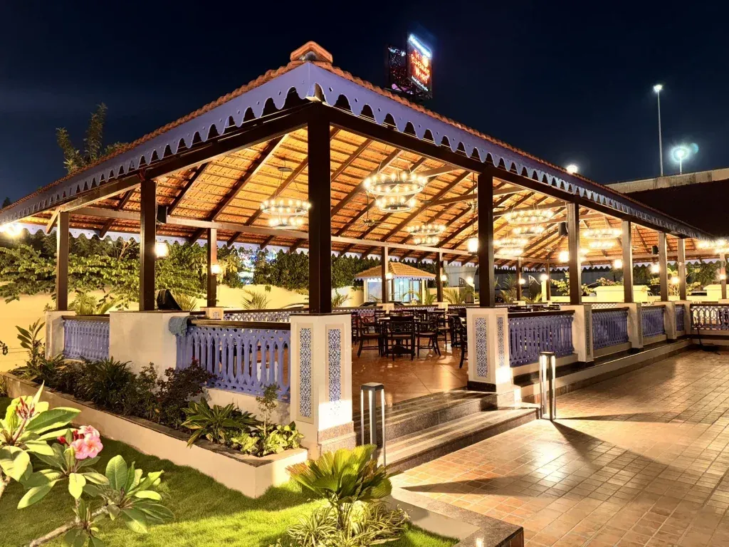 Pergola with integrated lighting and outdoor furniture