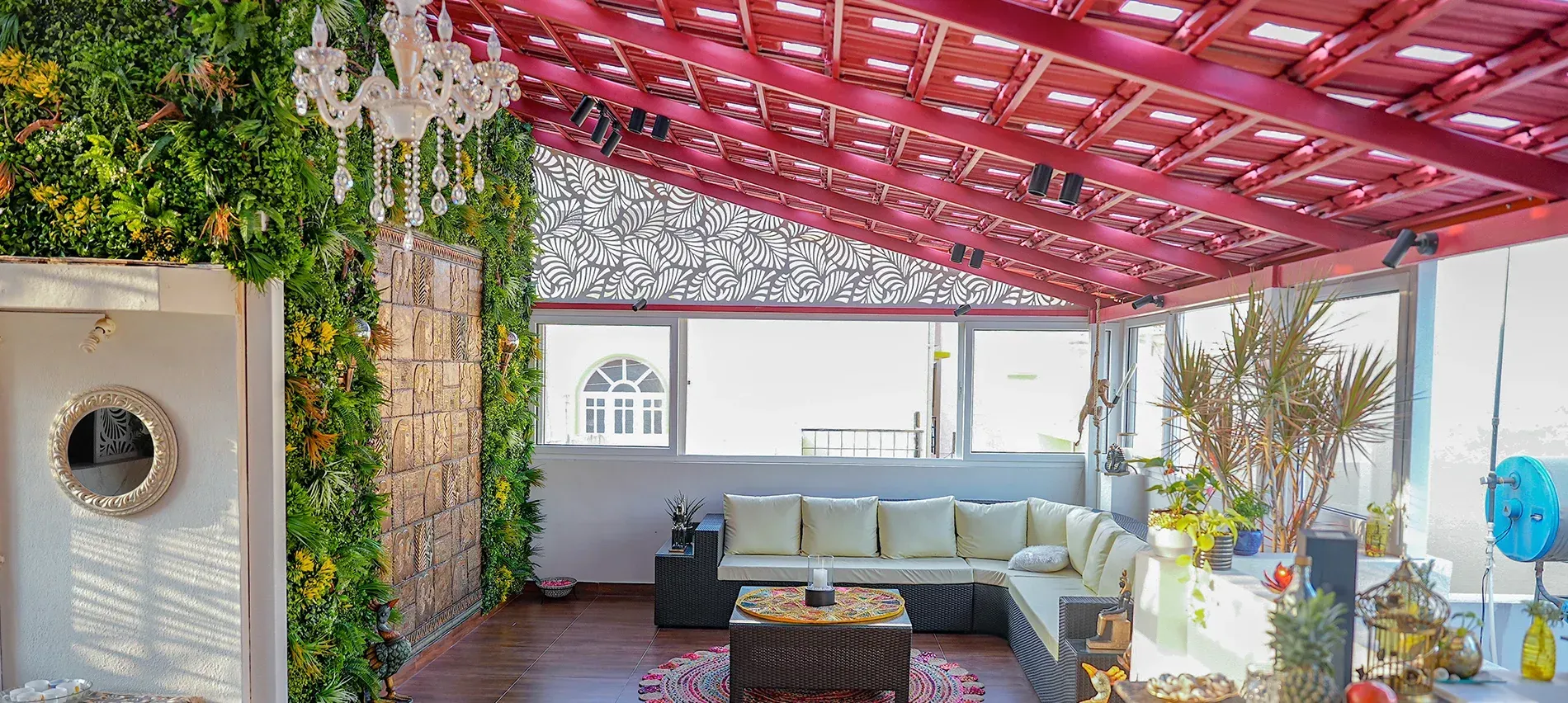After: completed Mangalore tile pergola with glass infill, enclosed sides and lounge seating